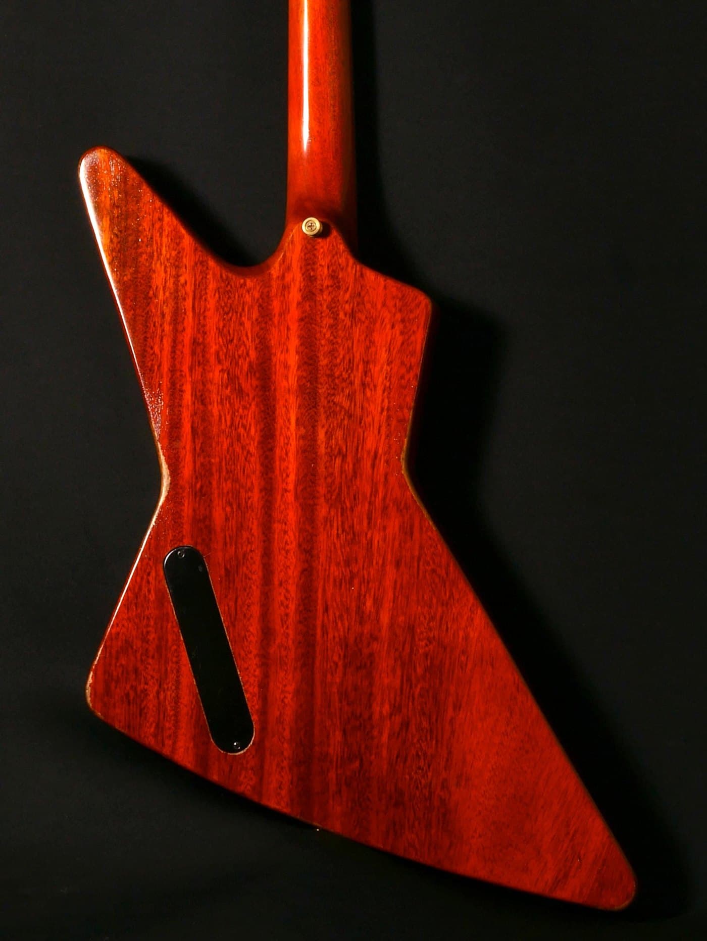 The Tatalias Legacy EX in faded cherry, a full closet-classic relic finish done in this paint room